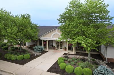 Beautiful exterior view of the facility entrance and landscaping.