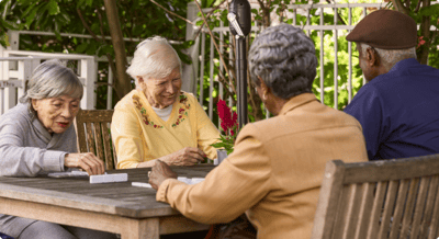 Residents enjoying a game outdoors.
