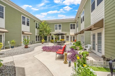 Courtyard with seating and vibrant flowers