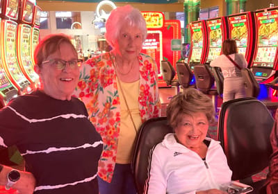 Residents enjoying time together at a gaming area.