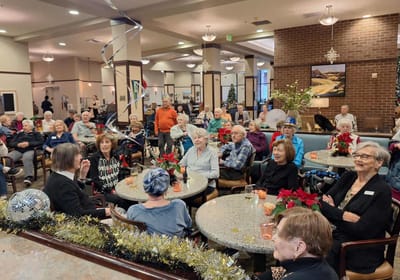 Residents enjoying a social event in a common area