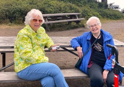 Two elderly women enjoying time outdoors
