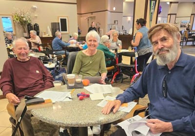 Residents enjoying time together in a common area.