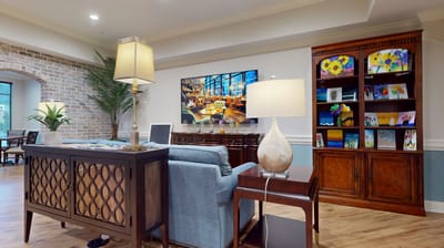 Comfortable common area with seating and art displays.