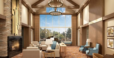 Spacious interior common area with seating and decorations.