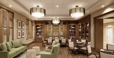 Cozy common area with bookshelves and seating