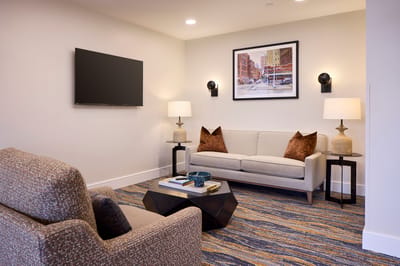 Cozy common area with a couch and artwork