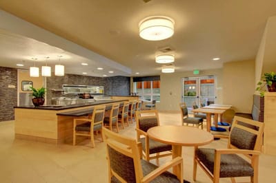 Modern dining area with tables and chairs