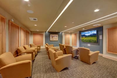Interior view of a cozy common area with seating.