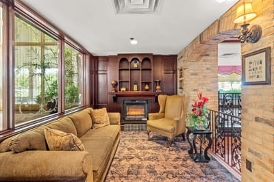 Cozy common area with seating and fireplace.
