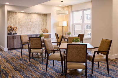 Common area with seating and decorative accents