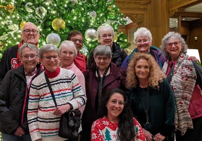 Group of senior residents celebrating together.