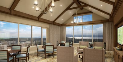 Interior common area with large windows and seating