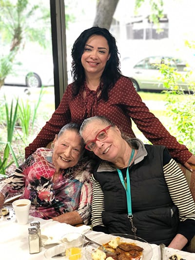 Residents enjoying a meal in the dining area