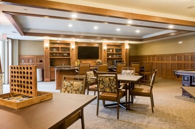 Interior view of a common area with seating and games
