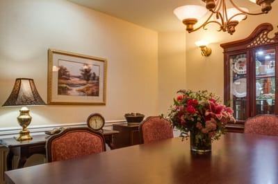 A cozy common area with floral decorations