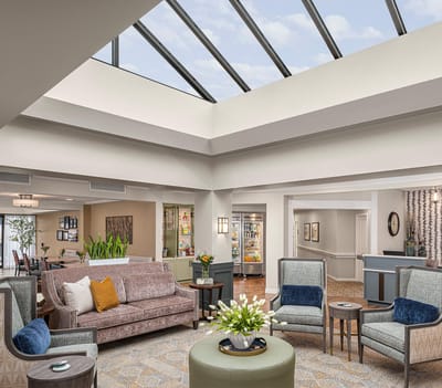 Bright common area with seating and natural light