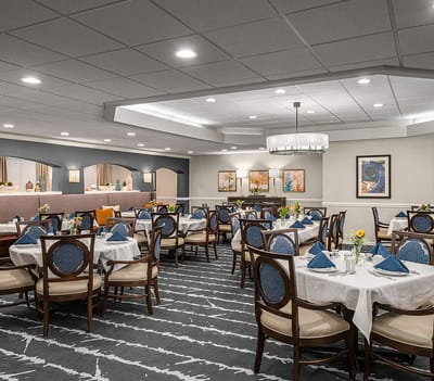 Elegant dining room setup with floral centerpieces