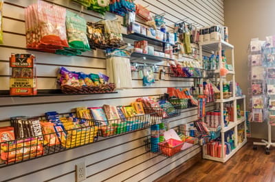 Interior view of a small convenience store with snacks