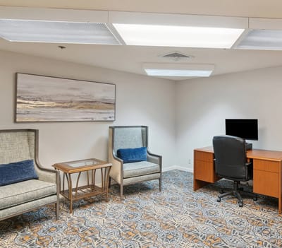 Bright interior with seating and desk area