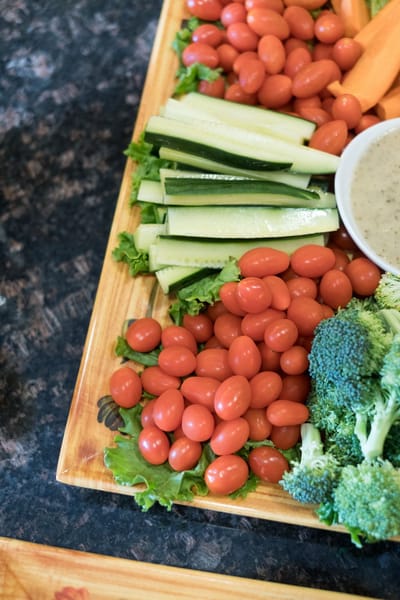 A fresh vegetable platter with assorted veggies