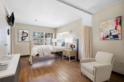 Bright, comfortable resident room with modern decor