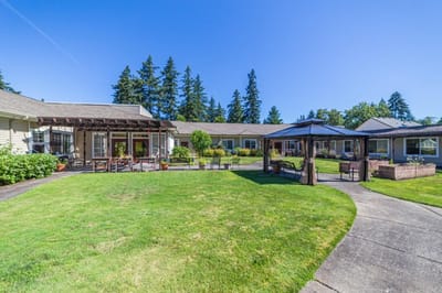 Exterior view of a landscaped outdoor space in a care facility