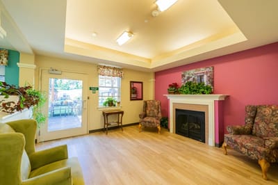 Common area with seating and a fireplace