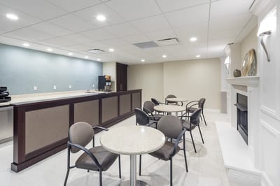 Interior common area with seating and a kitchenette
