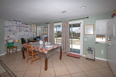 Interior view of a common area with tables and chairs