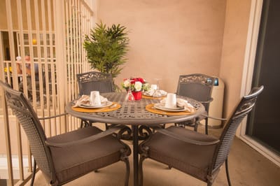 A nicely set table in a common area.