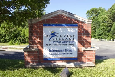 Sign for Discovery Village at the West End