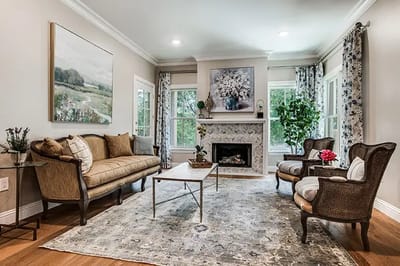 Bright and cozy common area with seating and decor