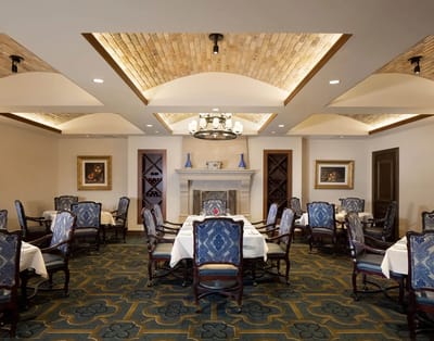 Elegant dining room with decorative lighting and tables