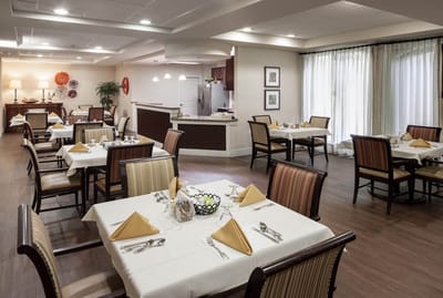 Dining area with tables set for meals