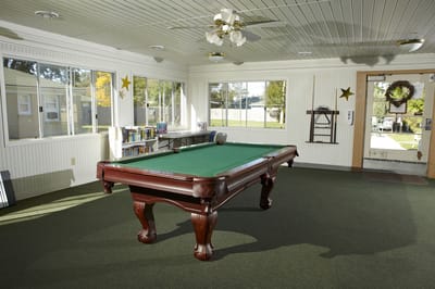 Interior view of a common area with a pool table