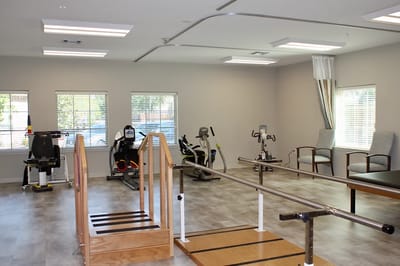 Interior of a therapy room with exercise equipment