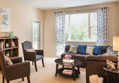 A cozy living area with comfortable seating and decor