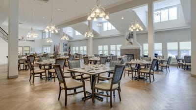 Spacious dining room set for meal service