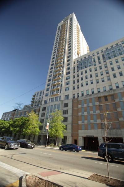 Exterior view of a tall assisted living facility