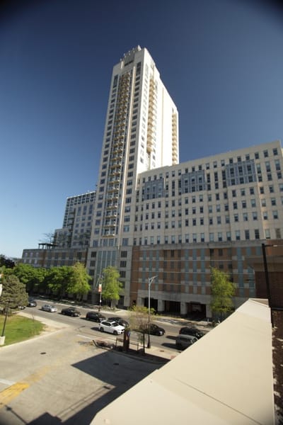 Exterior view of a tall senior living facility