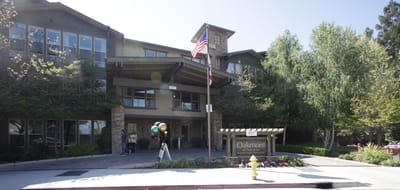 Exterior view of Oakmont of San Jose with signage