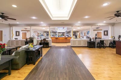 Bright interior of the facility with lounge area and reception desk