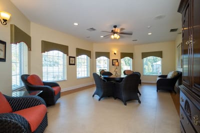 Bright common area with seating and windows