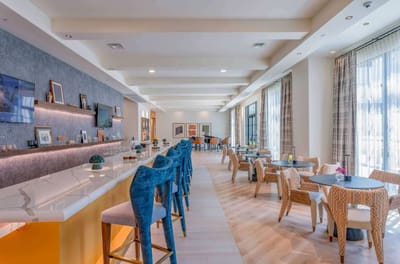 Interior view of a modern dining room with seating