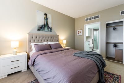 Cozy resident bedroom with warm lighting and decor
