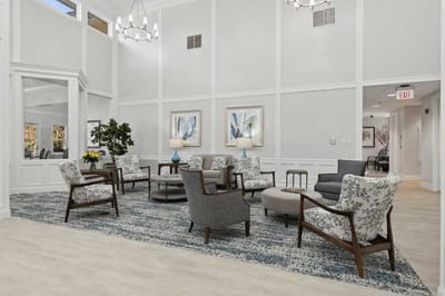 Bright common area with comfortable seating and decor