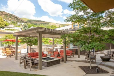 Outdoor seating area with patio and mountain view