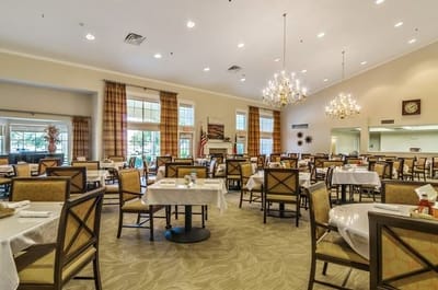 Dining area with tables and chandeliers
