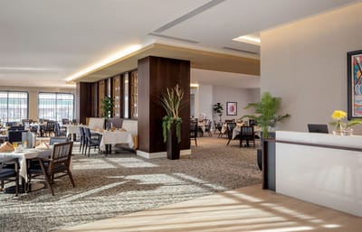Elegant dining room setup with tables and decor